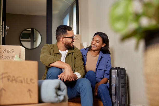 istock Indian couple relaxing after moving home 2172319967