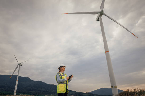 istock A highly skilled Wind Energy Technician diligently monitors and maintains wind turbines set in a stunning scenic landscape, ensuring their optimal operation for a more sustainable energy future 2172320760