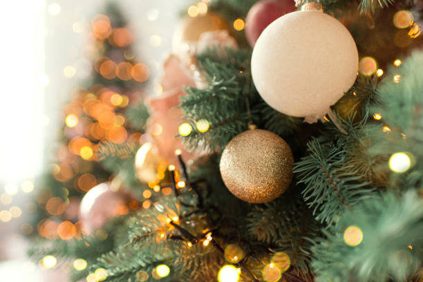 istock Christmas tree branches with decorations, balls, garlands, bokeh. Postcard with space for text. Merry christmas card. Winter holiday theme. Happy New Year. 2172322200