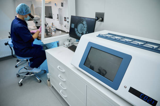 istock Embryologist monitors equipment during cryopreservation process in clinical lab 2172324113
