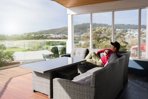 istock man drinking a cup of coffee outdoors 2172325042