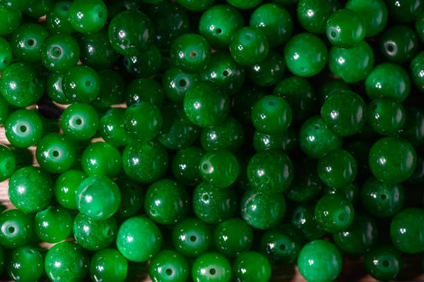 istock green balls of real stone for making amulets as a background 2 2172325900