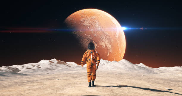istock Male Astronaut in Space Suit Confidently Walking On An Alien Planet. 2172326209
