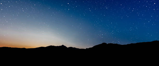 istock a Night sky panorama with stars and moon 2172327923