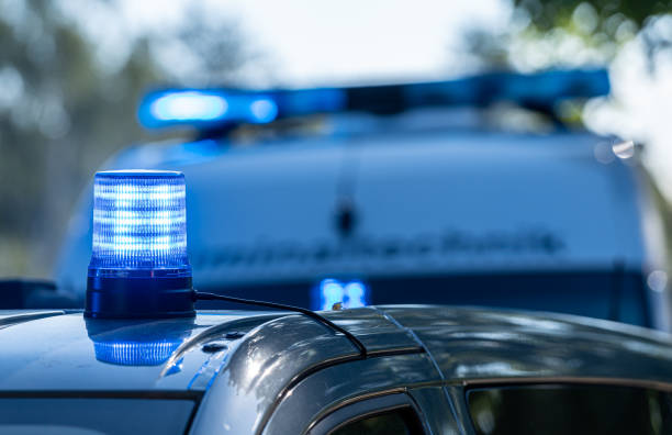Germany, Berlin, Spandau, September 15, 2024 -Blue flashlight on top of a police car