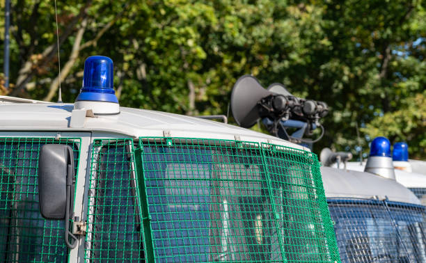 Germany, Berlin, Spandau, September 15, 2024 -Police vehicles with barred windows