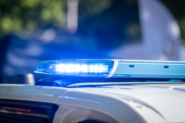 istock Blue flashlight on top of a police car 2172329688
