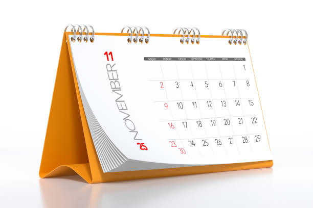 istock November 2025 Calendar and Thumbtacks on Orange Background. 3d Rendering 2172332132