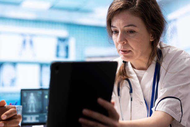istock General practitioner presenting the test findings via scan interpretation 2172335075