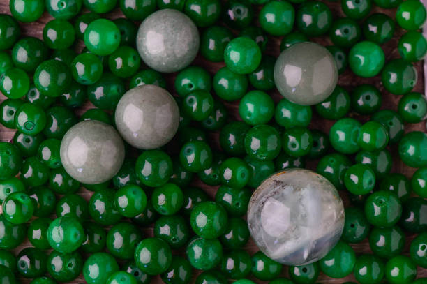 istock green beads made of real stone as a background 2 2172336882