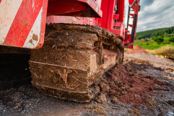 istock Dirty Bulldozer Continious Track of a Construction Vehicle Construction Site 2172339348