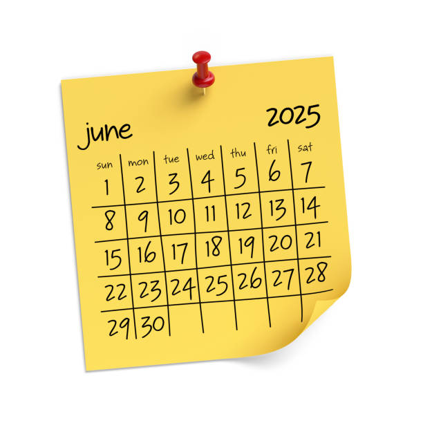 Desk calendar on wood background