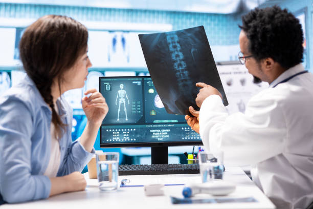istock Medical expert specialist explaining the x ray imaging for a diagnosis 2172345433