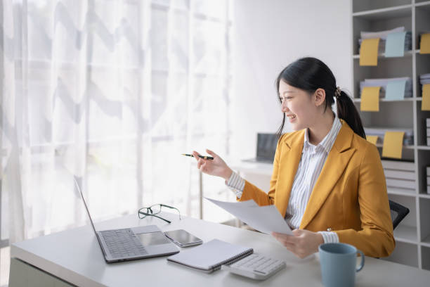 istock business woman using computer laptop meetings conference to plan a marketing strategy for finance meeting aiming to align financial goals with market opportunities 2172346521