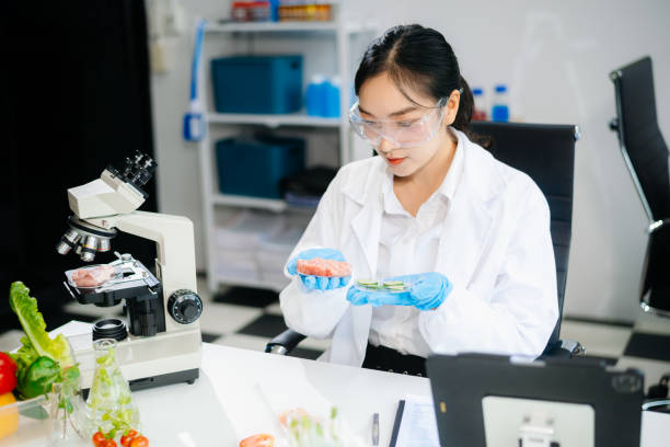 istock Food scientists in lab coats, testing samples, and analyzing food safety and quality 2172348547