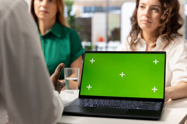istock HR coworkers using mockup notebook to identify employees to get hired 2172351693