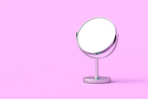 istock One desktop makeup mirror with white isolated space on pink background. Cosmetic accessories. 3d render 2172357227