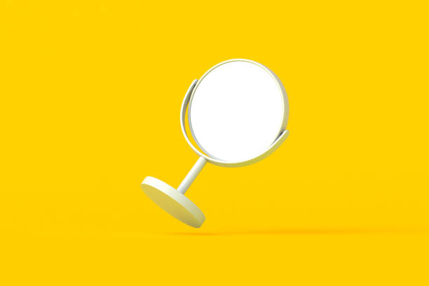 istock Falling desktop makeup mirror with white isolated space on orange background. Cosmetic accessories. 3d render 2172357233