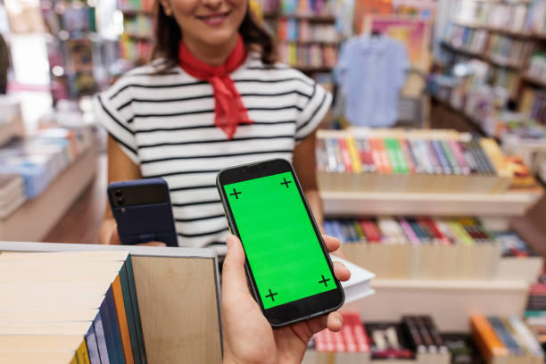 istock Woman scanning a QR code with her smartphone 2172358749