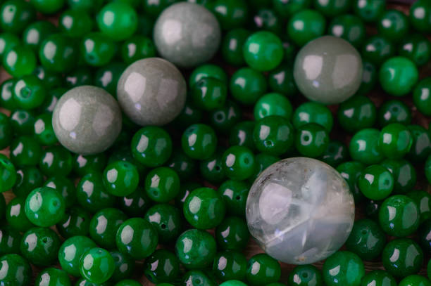 istock green balls of real stone as a background 2172360051