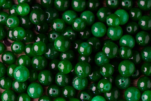 istock green balls of real stone for making magic amulets as a background 2 2172360058