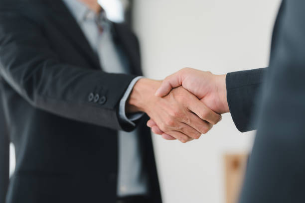 istock Successful business handshake symbolizes partnership and agreement. 2172365033