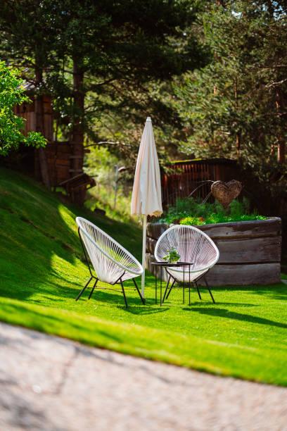 istock Fresh Cut Lawn With Designer Garden Chairs on a Sunny Summer Day 2172365500