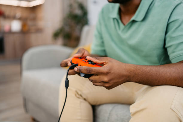 istock Young Man Playing Video Games On A Joystick At Home 2172366078