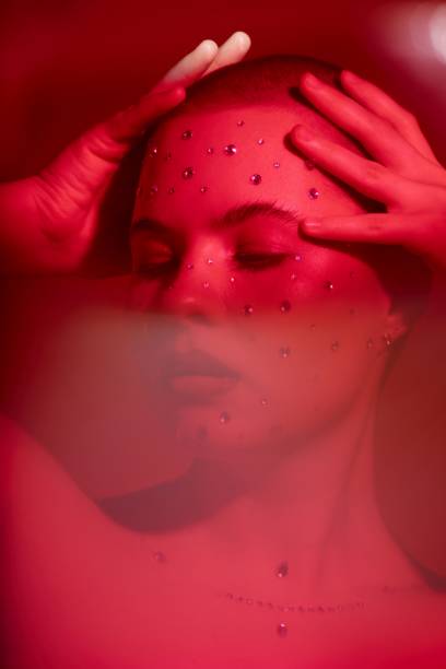 istock Sensual Girl with Crystal Makeup Confidently in Red 2172366106