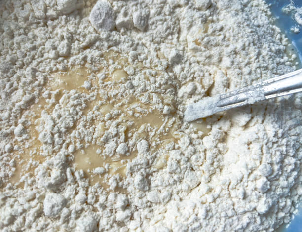 istock Kneading the dough. mixing batter with flour. flour on the dough. 2172366150
