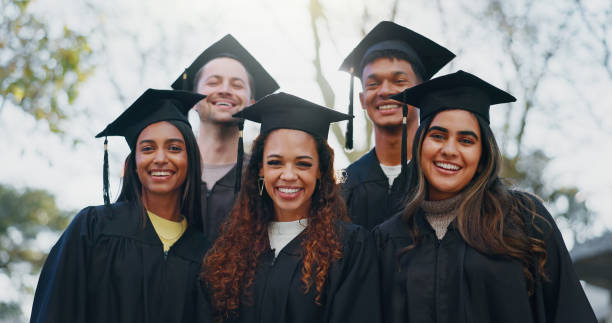 istock Students, graduation class and outdoor portrait for education, learning and group for success. People, university and celebration for college achievement, support and together for certification 2172370201