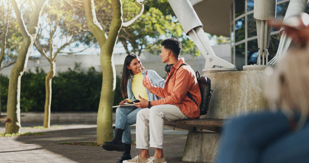 istock Bench, university or students on break talking or speaking of scholarship, education and future plan on campus. Outdoor, school or happy friends in college bonding in fun conversation for support 2172370319