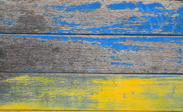 istock Blue yellow old wooden planks texture background. 2172370406