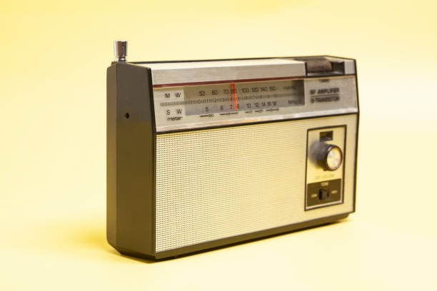 istock Vintage transistor radio, on yellow background. 2172376186