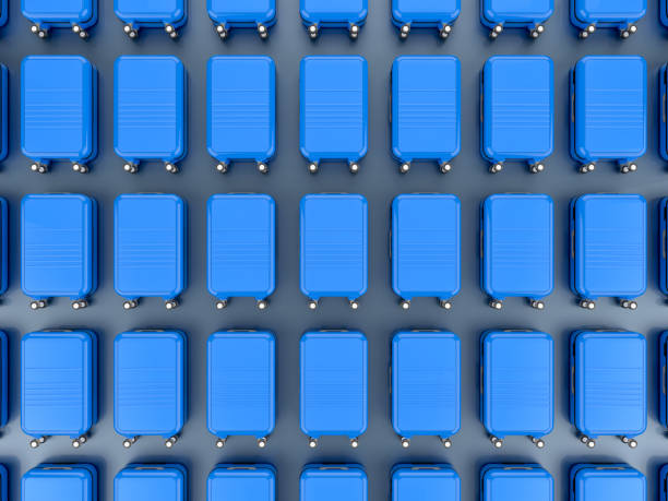 istock A lot of blue luggages in a row 2172384269