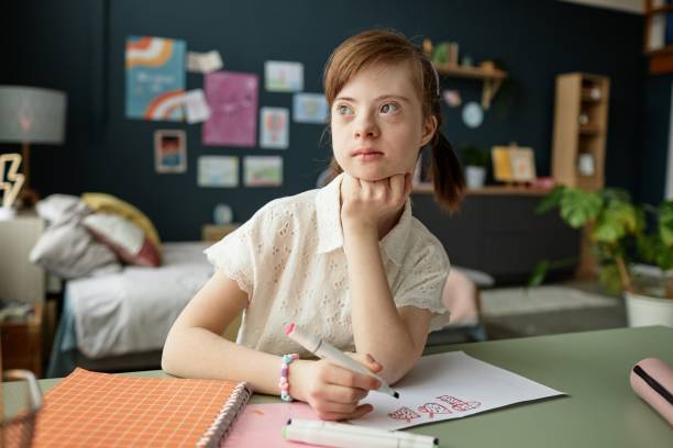 istock Young Girl Drawing in Bedroom While Daydreaming 2172384528