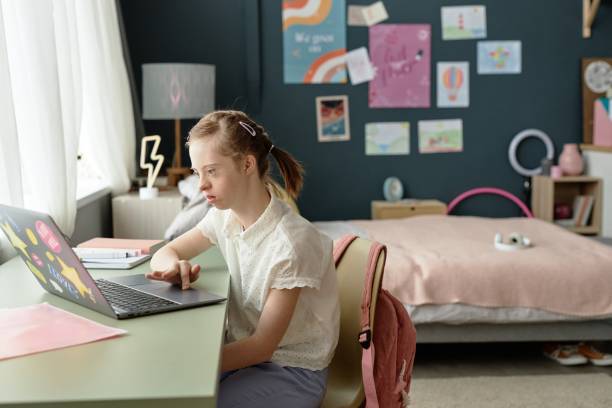 istock Engaging in Online Learning with Laptop in Bedroom 2172384552