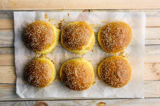 istock Homemade burger bun on parchment 2172390112