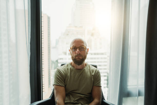 istock Man portrait by skyscraper window in New York Manhattan 2172391220