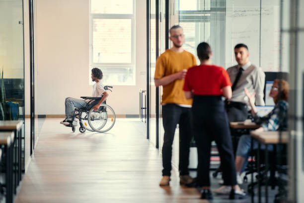 istock A dynamic group of young entrepreneurs engages in vibrant discussion within a modern glass office space, exploring new business projects and fostering innovation 2172397041