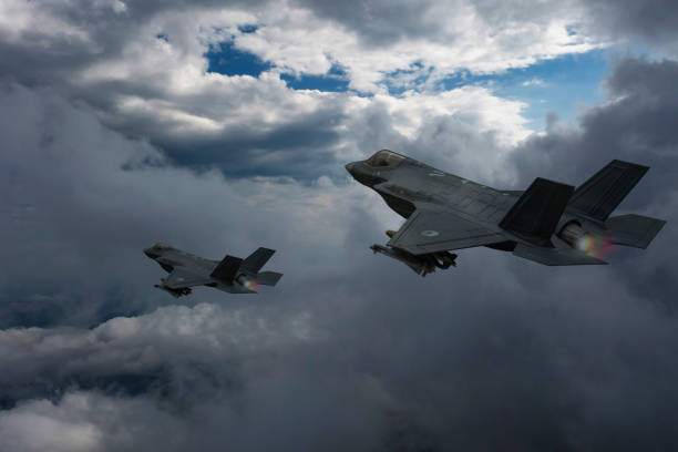 istock Jet fighters flying over the clouds. 2172397970