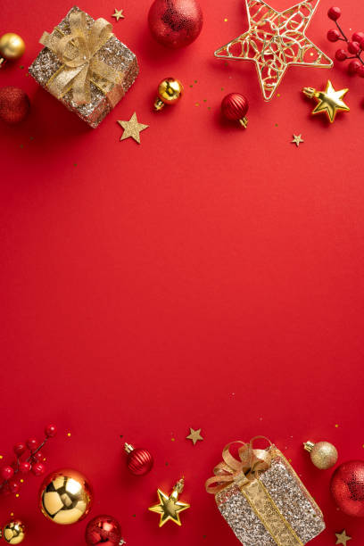 istock Beautiful red Christmas vertical background featuring glittery gifts and assorted decorations evoking holiday cheer and celebration 2172401583