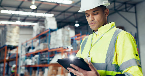 istock Logistics, tablet and supply chain with man in warehouse for distribution, freight or shipping. Export, delivery or cargo storage with digital checklist for customs compliance in inventory management 2172408353