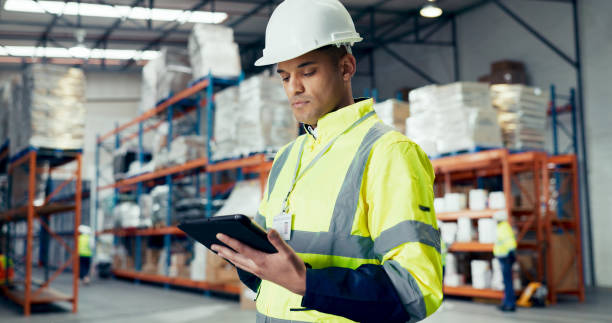 istock Logistics, tablet and shipping with man in warehouse for distribution, freight or supply chain. Export, delivery or cargo storage with digital checklist for customs compliance in inventory management 2172408400
