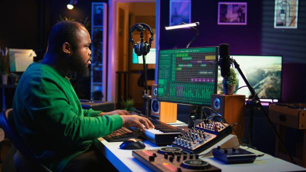istock Producer composing new track with electronic gear in his home studio 2172410746