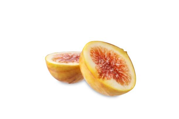 Fresh sweet raw fig on a white isolated background