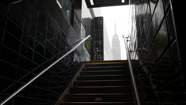 New York City underground subway metro. Empire State building. Metropolitan entrance exit, Manhattan