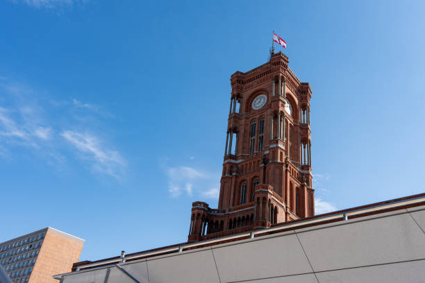 istock A tall red tower with a clock on it. Red Town Hall of Berlin. 2172421091