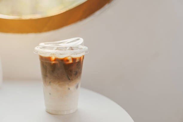 istock Iced latte coffee, placed on a table in a cafe. 2172422065