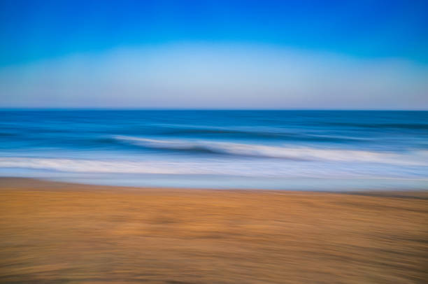 istock Serene Long Exposure of Ocean Waves at Sunset 2172423711